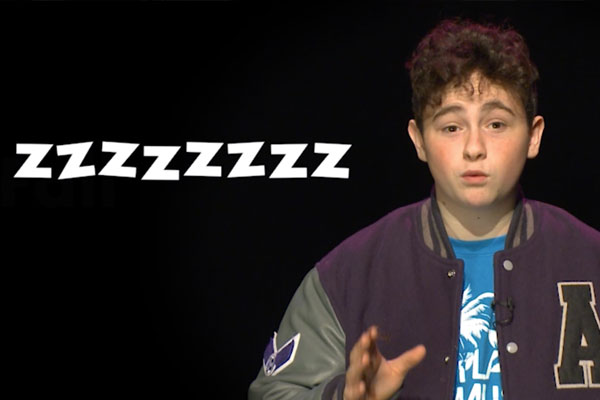a teen on a black background with zzzzzzzs