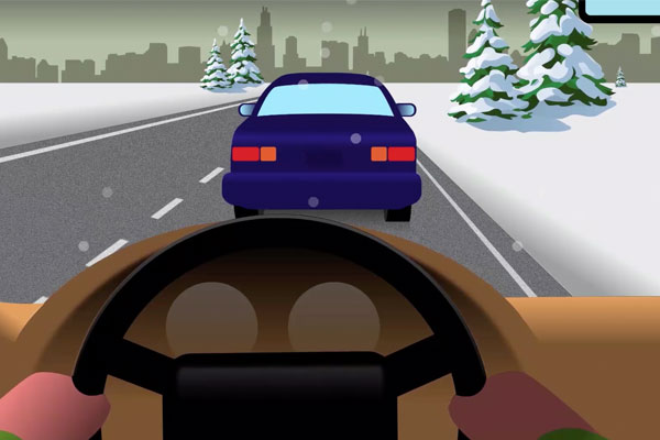 driver's view of driving in winter conditions with a car in front and snow